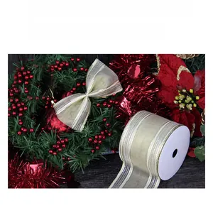 Detail of champagne gold organza ribbon with gold wired edges for Christmas DIY crafts