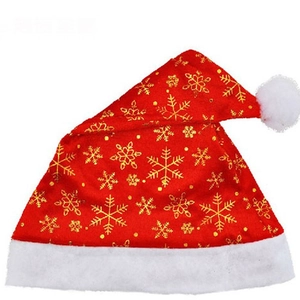 Classic red Christmas hat with golden snowflake patterns and white plush trim and ball