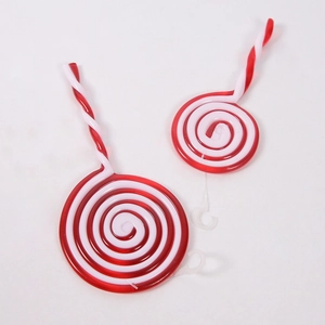 Close-up of red and white spiral lollipop ornaments for Christmas tree decoration