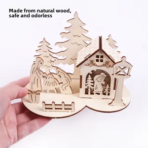 Detailed laser-cut natural wood nativity scene ornament featuring 3D carved stable and figures