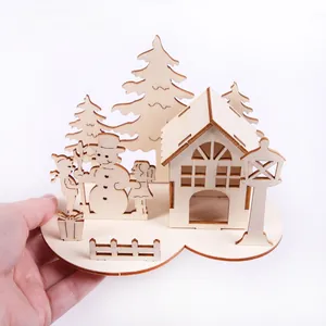 Detail of DIY laser-cut wooden Christmas snowman house puzzle with a natural wood finish