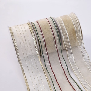 Three rolls of decorative Christmas wire-edged ribbons in cream, gold, and champagne colors