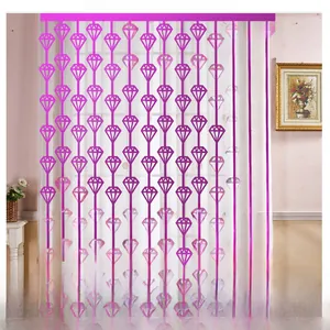 Close-up of purple diamond-shaped beaded fringe curtain for party background decor