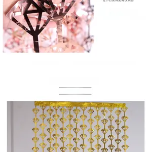 Close-up of geometric diamond fringe curtain in rose gold and gold for party backdrop