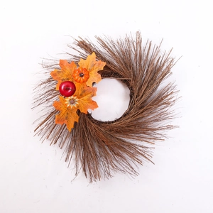 Halloween twig wreath with autumn maple leaves, pumpkin and berries on white background