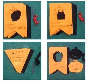 Detail view of Happy Halloween non-woven felt banners with orange and black bunting flags