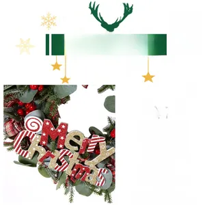 Close-up of Christmas wreath with eucalyptus leaves, red berries and Merry Christmas sign