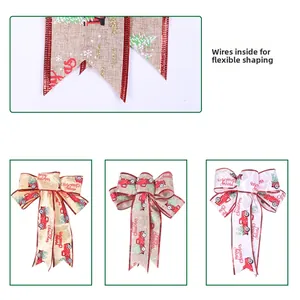 Detail of Christmas burlap ribbons with wired edges showing vintage truck and tree patterns