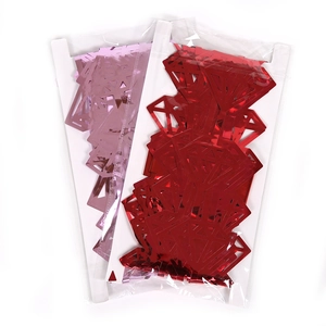 Sparkling diamond-shaped foil curtains in red and pink for festive party wall decor