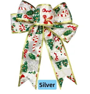 Detail of 20cm Christmas bow with Santa and snowman patterns and gold edge stitching