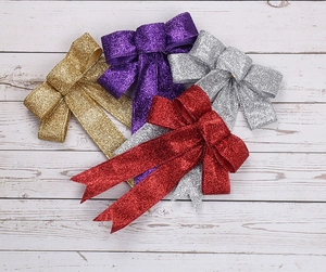Details von 23 cm glitzernden Weihnachtsschleifen in Gold, Rot, Silber und Violett