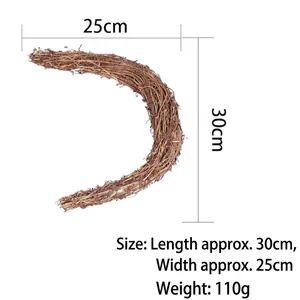 Detail showing 30x25cm dimensions of moon-shaped natural grapevine Christmas wreath base