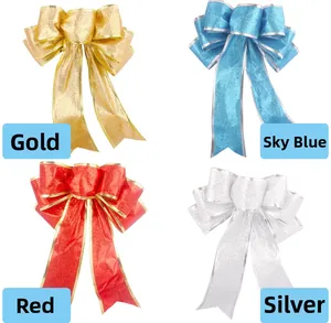 Detail of 20cm glitter Christmas bows in gold, sky blue, red and silver for tree decor