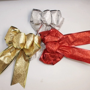 Glittering 20cm Christmas bows in gold silver and red for festive tree decorations
