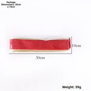 Detail view of red Christmas ribbon roll in packaging with size and weight info