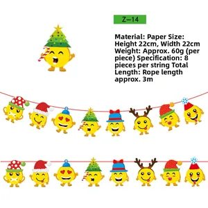 Detail of Christmas emoji paper banner with Santa hats and reindeer antler motifs