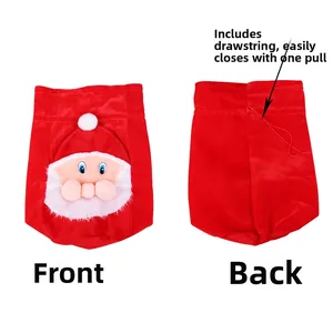 Detail of red velvet Santa gift bag featuring drawstring closure and 3D plush design