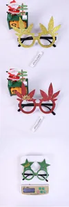 Close-up of sparkling Christmas glasses with gold Merry Christmas lettering for party