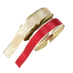 Detail of 10m gold and red Christmas ribbons with sparkling metallic woven texture