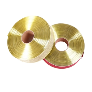 Close-up of 10m metallic Christmas ribbons with gold glitter and red threaded edges