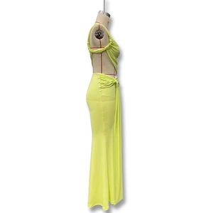 Detail view of the fluorescent green bodycon maxi dress with side knot and ruching effects
