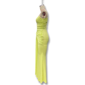 Detail view of the fluorescent green maxi dress with side ruched texture and gathered fabric