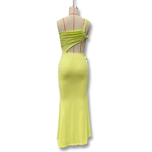 Detail of lime green one-shoulder maxi dress featuring ruched fabric and backless cutout