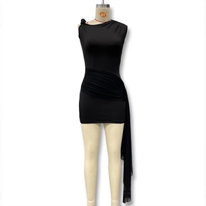 Detail of the ruching effect and long ribbon on a black one-shoulder slim-fit mini dress