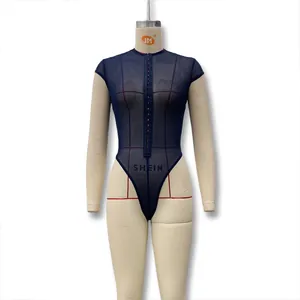Detail of dark blue mesh bodysuit featuring a row of front hook-and-eye closures