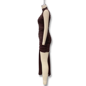 Detail view of the side ruched texture on a slim fit sleeveless brown turtleneck dress