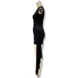 Detail of a black bodycon mini dress featuring side ruched seams and long mesh ribbon ties