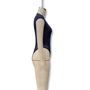 Detail of sheer navy mesh bodysuit featuring metal buckle and high-cut leg on mannequin