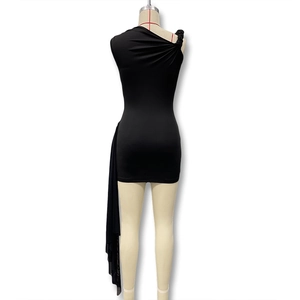 Detail view of black one-shoulder dress featuring elegant side streamers and pleated texture