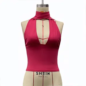 Hot pink halter neck crop top with a deep V-neck and slim fit for summer wear