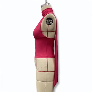 Side view of backless halter top in rose red with slim fit and high neck design