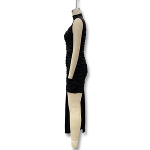 Close-up of the elegant side ruching and gathered fabric detail on this black sleeveless dress