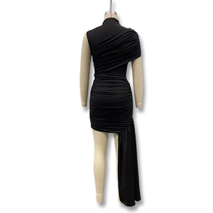 Detailed back view of a black ruched bodycon dress with an asymmetrical hemline design