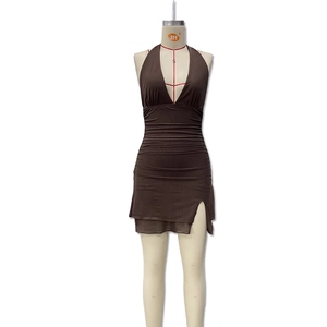 Detail view of ruched deep V-neck halter dress in dark brown with side split hem