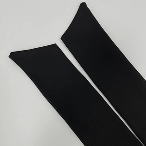 Detail of premium black elastic fabric showing high-density knitting for sun protection sleeves