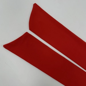 Close-up of red elastic fabric arm sleeves for summer backless halter top outfits