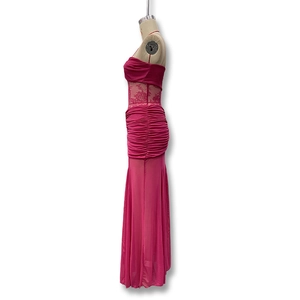 Detail of ruched fabric and floral lace cut-out on fuchsia sleeveless maxi dress