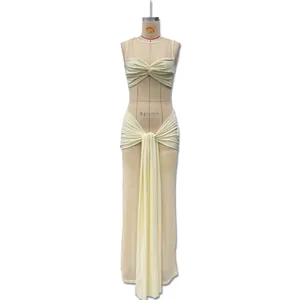 Detail of cream mermaid dress featuring twist-front bodice and elegant side streamers