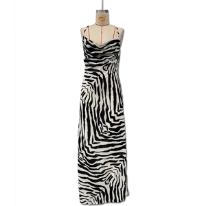 Detail of the cowl neck design and zebra print pattern on this sexy vacation maxi dress