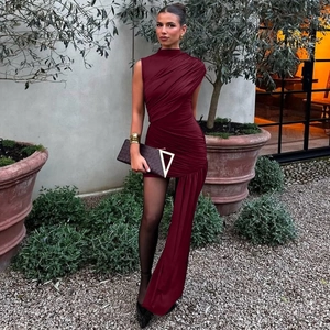 Detailed view of ruched burgundy sleeveless dress with long asymmetrical sash detail