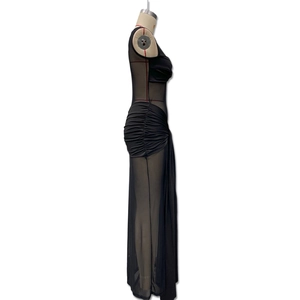 Detail of black mesh sleeveless evening dress featuring ruched sides and side slit