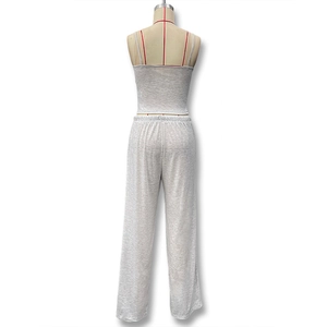 Détail de la taille élastique à cordon du pantalon large en maille gris chiné