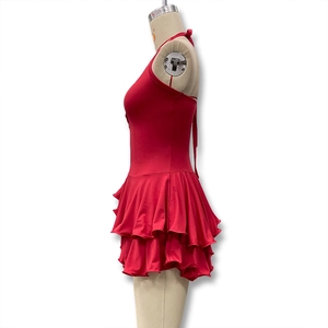 Detailed side view of red halter neck dress with tiered ruffle hem and glossy stretch fabric