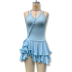 Detail of light blue halter neck dress featuring layered ruffles and button decor