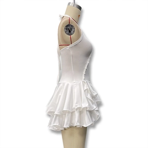 Detail of white halter neck dress with side buttons and tiered ruffle skirt on mannequin