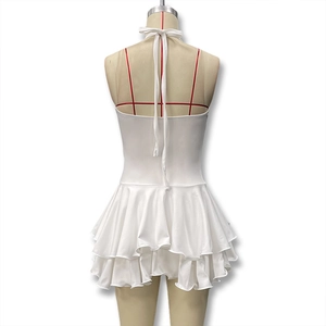 Close-up of white halter neck dress with ruffled hem and open back design detail